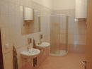 Rekonstrukce koupelen a bytových jáder v Kroměříži, Hulíně, Praze 